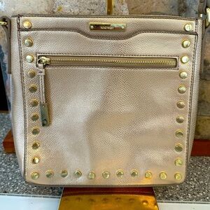 NINE WEST crossbody in gold shimmer pebble leather and riveted gold accent studs